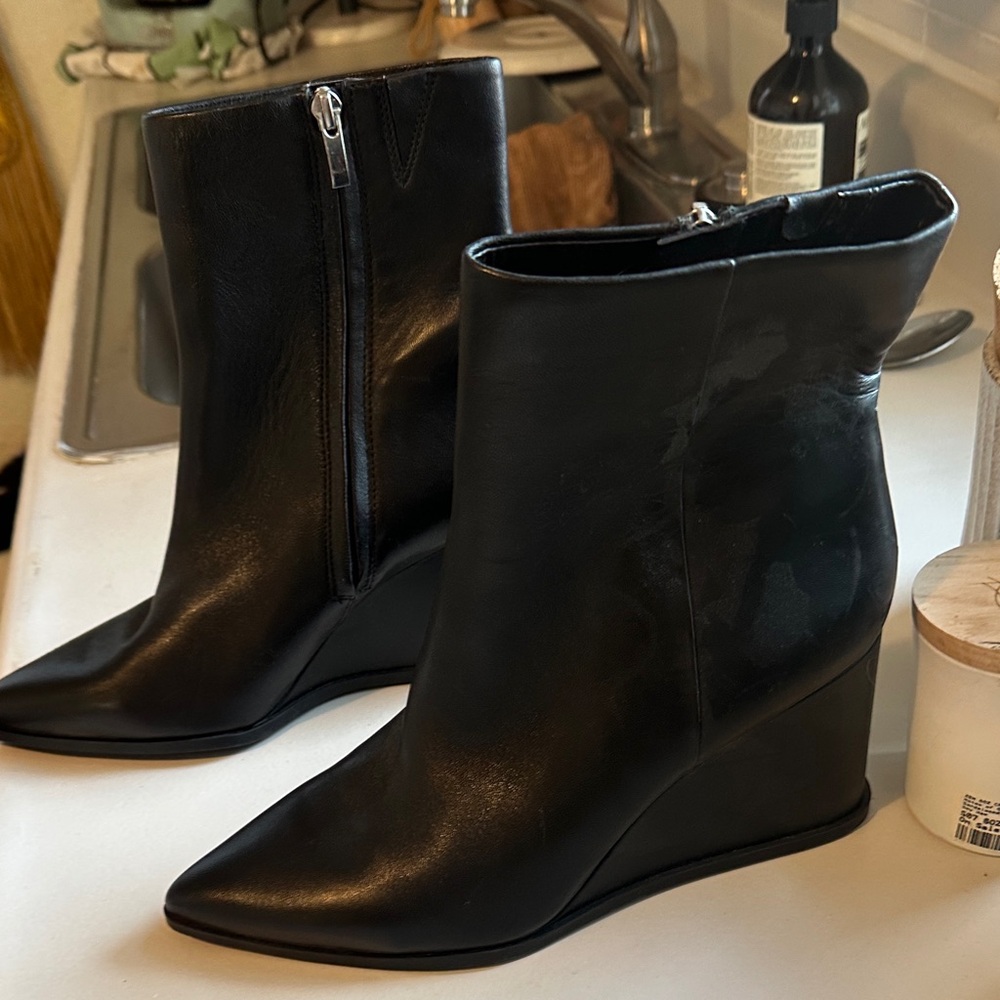 Sleek Black Wedge Heeled Boots